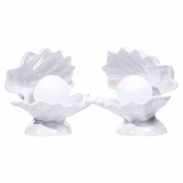 Bring timeless coastal glamour to your home with this striking vintage oyster clam shell table lamp. Designed in the...
