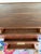 A striking 1960s lowboy dresser from Stanley Furniture's "Distinctive Furniture" line, fully restored to showcase the rich...