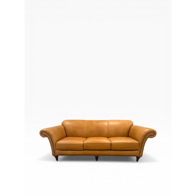 A finely crafted Hancock & Moore leather sofa, exemplifying the brand’s commitment to premium American craftsmanship and...