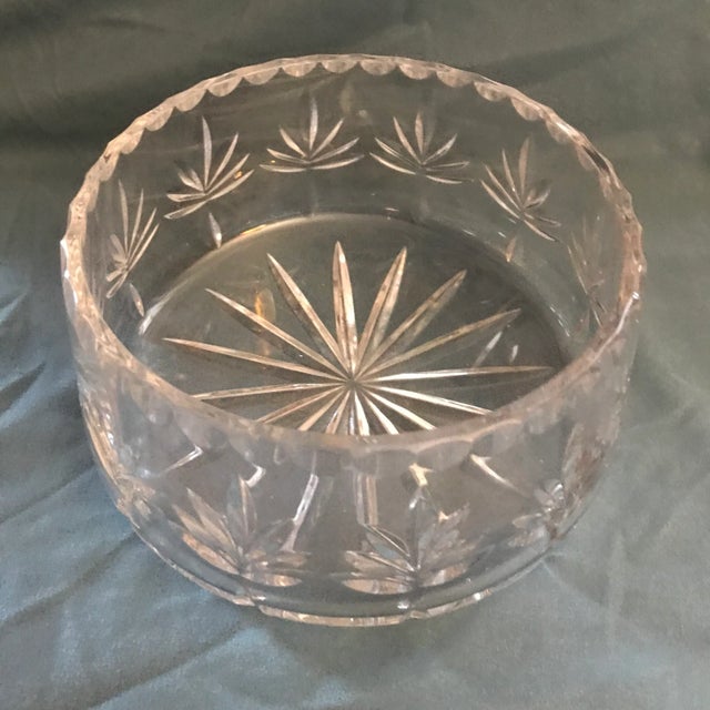This is a gorgeous heavy etched crystal bowl, mid century modern or contemporary style. It features an etched star on the...
