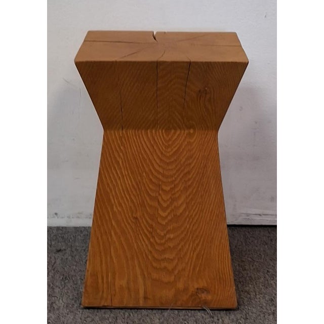 In the style of Christian Liaigre Nagato side table/stool carved from oak, can be sold in a set of 2 or individually....