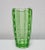In this listing you will find a beautiful Art Deco green glass vase. It's done in beautiful light green glass and features...