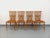 Four vintage rattan chairs from the 1950s/60s, in the style of Adrien Audoux and Frida Minet, in very good overall...