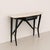 Elegant Italian Mid-Century Modern console table from the 1950s, attributed to Ico Parisi, crafted in black ebonized wood...