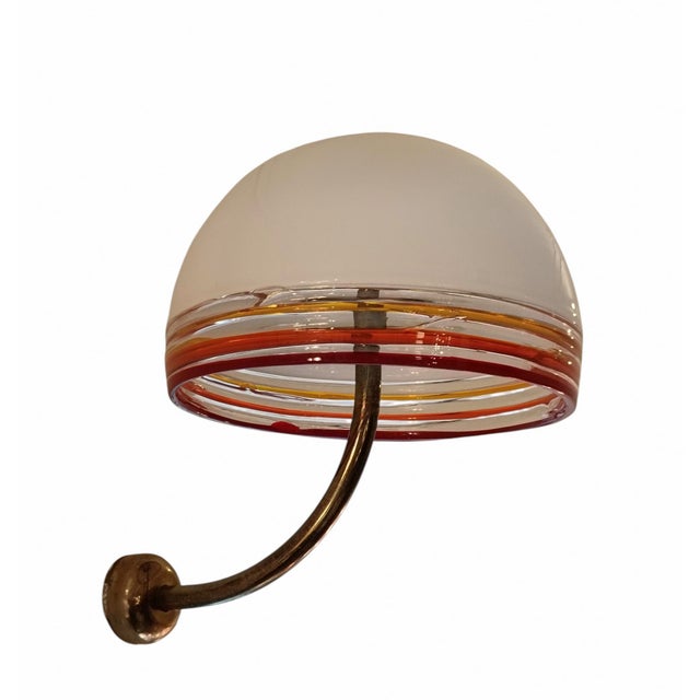 Extremely rare pair of Mod.Febo wall lamps, designed by Roberto Pamio and Renato Toso for Leucos. The lamps have an...