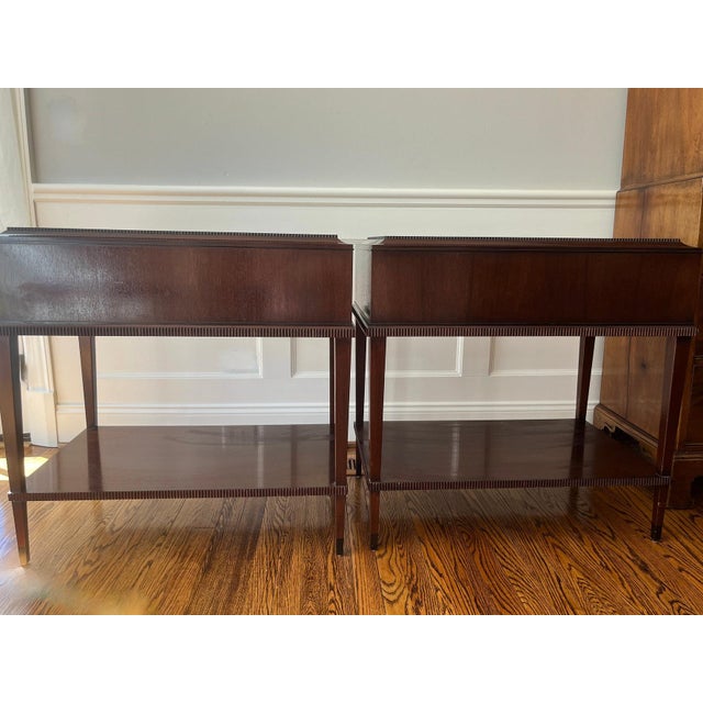 Pair of sleek and substantial mahogany side tables from the luxury Madeline Stuart collection. One drawer. Very heavy...