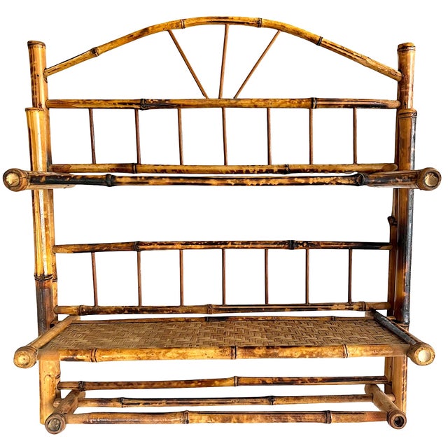 A beautifully scaled vintage burnt bamboo wall shelf blending British Colonial, French Colonial, and island-inspired...