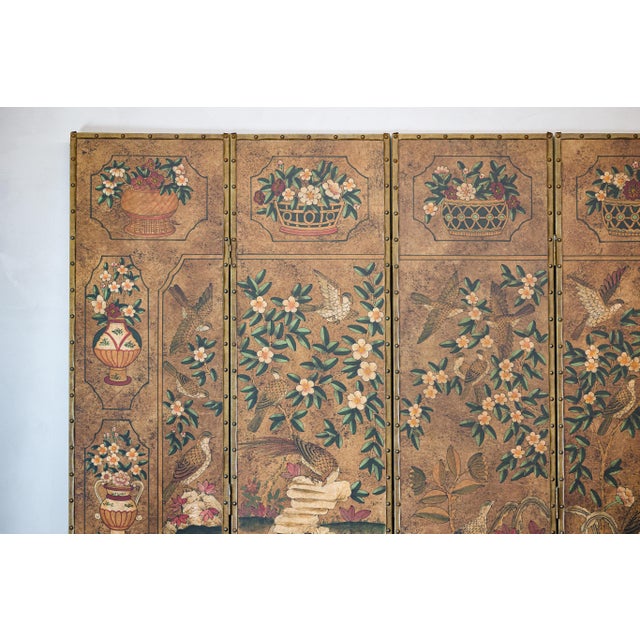 This vintage six-panel screen, crafted from hand-painted leather, showcases an intricate scene of birds, roosters, and...