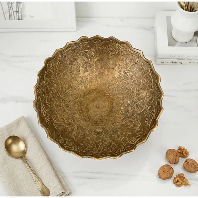 Dimensions: 9" W X 9" D X 5" H This vintage brass bowl is handcrafted by artisans using basic hand tools. Due to the...