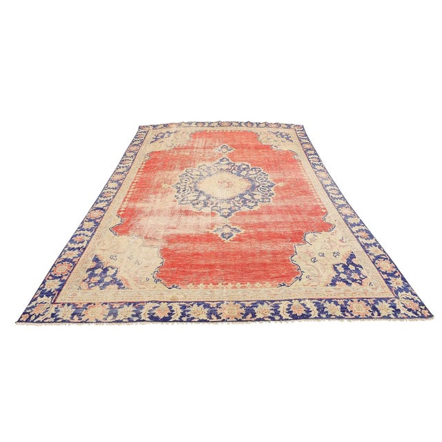 Handknotted vintage wool rug from Oushak region of Turkey. Approximatelly 50-60 years old. In very good condition.