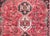 A gorgeous mid-20th century Persian Shiraz rug with a stunning pattern with three large stylized floral medallions living...