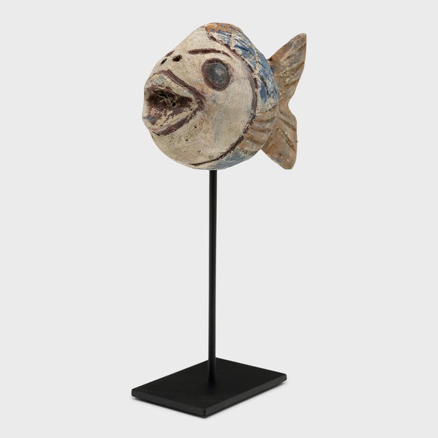 Hand-carved from reclaimed wood, this colorful koi fish is a traditional symbol of harmony, wealth and luck. The rustic...