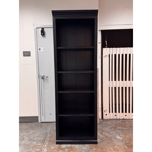 Design Plus Gallery presents the Tuscan Flush Bookcase from Ballard Designs. This tall, rectangular bookcase is defined by...