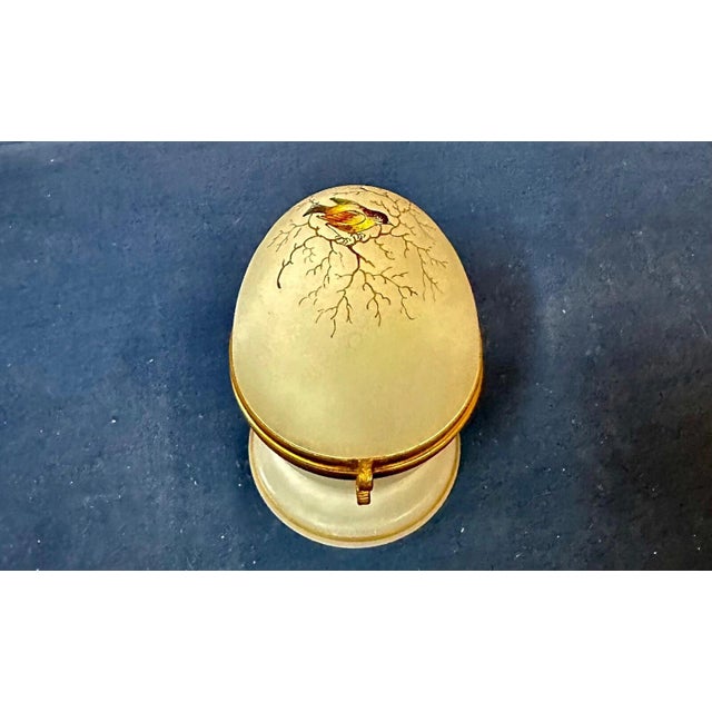 This vintage Victorian egg shape frosted glass perfume holder is beautifully designed with a hinged lid cover decorated...