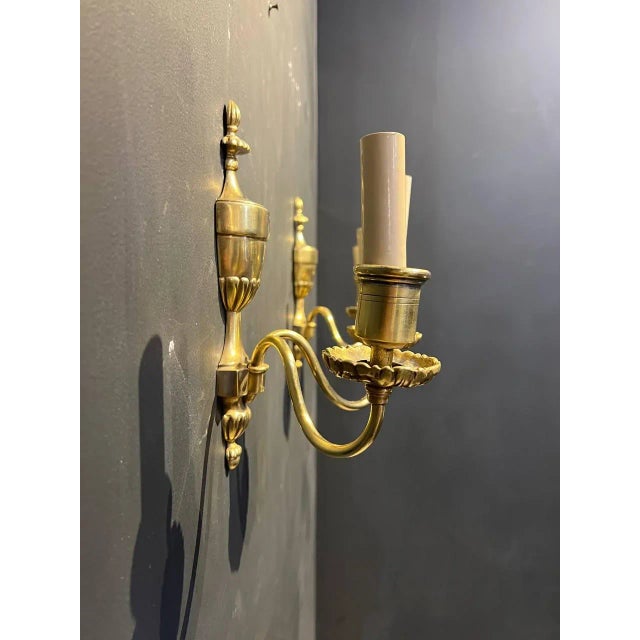 A circa 1920's Caldwell gilt bronze sconces with two lights.