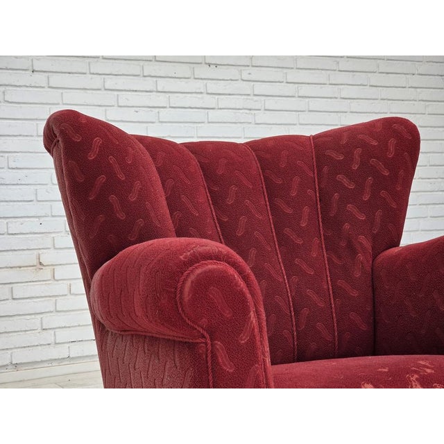 1950s, Danish relax armchair. Original red furniture wool, oak wood legs, brass springs in the seat. Original good...