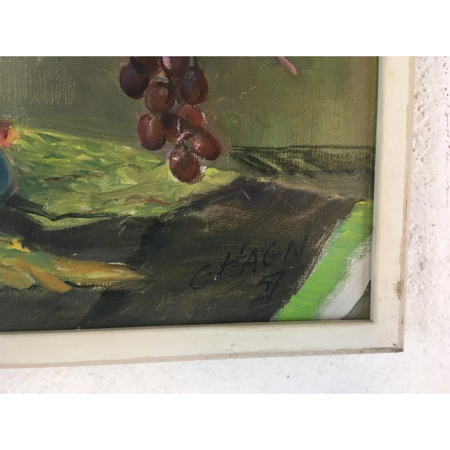 Vibrant color and detailed work, this vintage piece will be a great accent to a room!