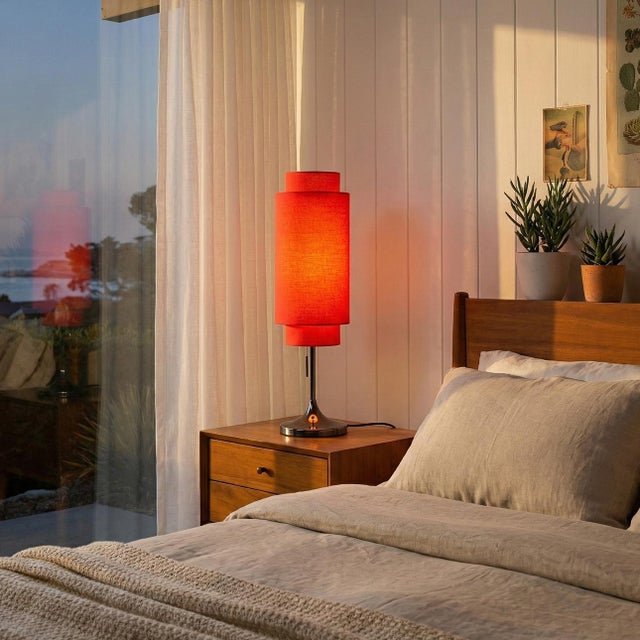 The Lollipop Table Lamp in Crimson Red brings vibrant energy and iconic mid-century charm to your space. Originally...