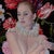 Regal by Suzy Smith | Oil on canvas Portrait of a woman with floral background For Sale