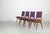 This set of four chairs by Maurice Pre from the 1950s shows typical signs of wear. The mauve skai is original; there is...