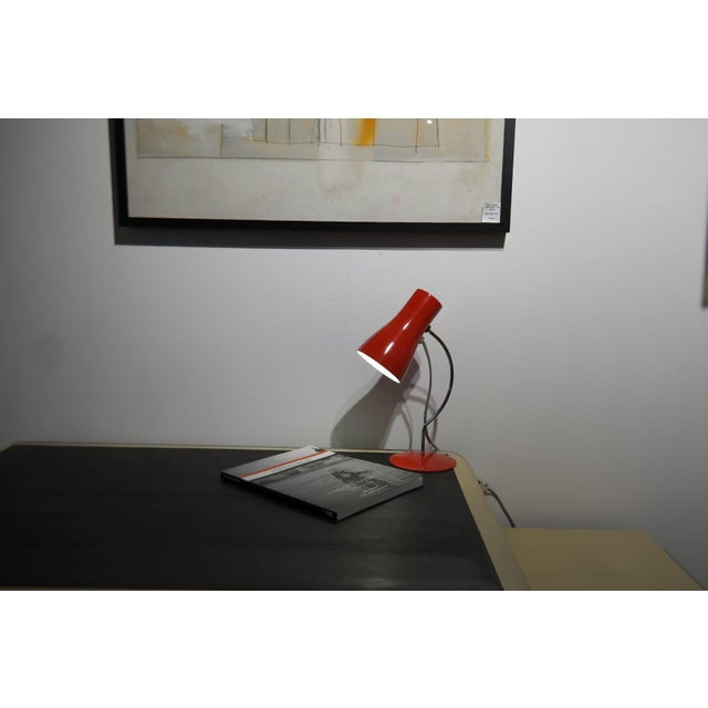 Vintage red metal and chrome table lamp with adjustable lamp shade designed by the famous Josef Hůrka. Produced in former...