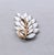 1960s goldtone prong set marquise white rhinestone with a thinner marquise on the top section with a single round white...