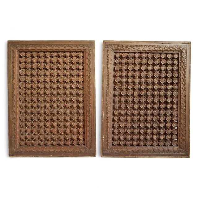 Antique carved teak wood ceiling panel with beautiful intricate repeating flower pattern. Leaf scroll design on frame....