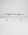 Made in Italy, this metal and glass table was imagined by designer and architect, Norman Foster, a premiere force in high-...