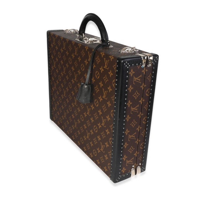 Reminiscent of Louis Vuitton’s iconic trunks, this briefcase is decorated with the signature brown monogram pattern and...