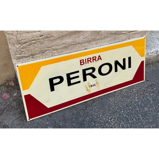 Vintage enameled sheet metal sign for Peroni beer, in the style of period Italian advertising. "1846," a reference to the...