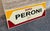 Vintage enameled sheet metal sign for Peroni beer, in the style of period Italian advertising. "1846," a reference to the...