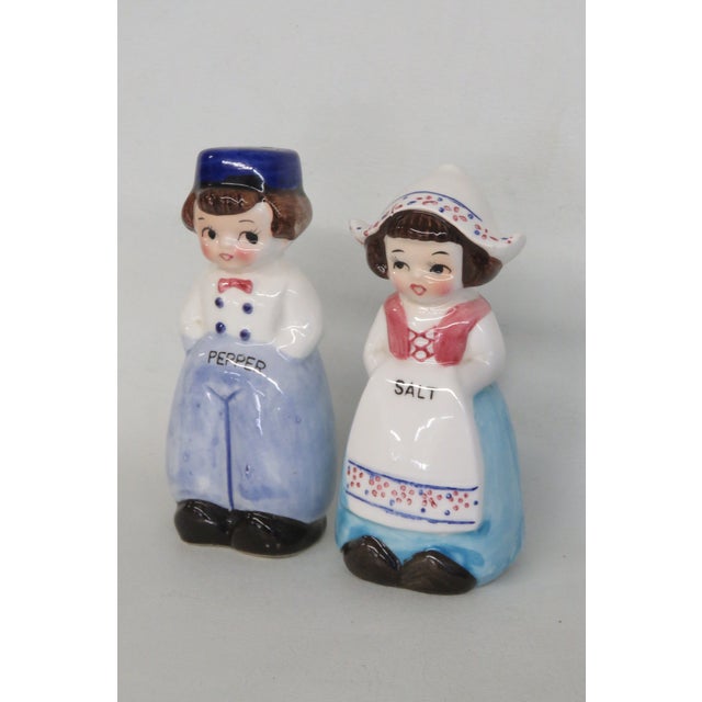 Mid-Century Modern Mid 20th Century Dutch Boy and Girl Ceramic Salt and Pepper Shakers Hand Painted - Set of 2 For Sale - Image 3 of 13
