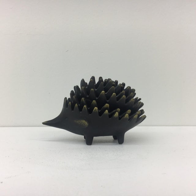 A midcentury brass stackable hedgehog set of six ashtrays. A design by Walter Bosse, executed by Hertha Baller Austria in...