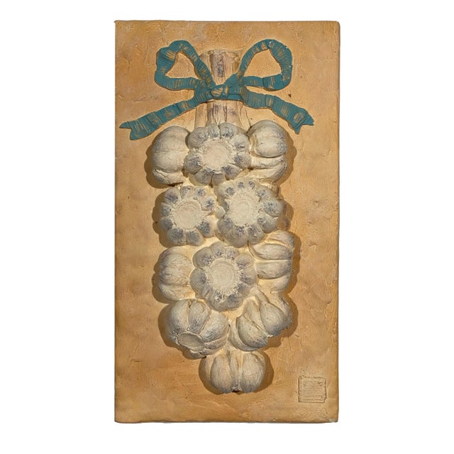 This Garlic wall plaque was created by Australian Ceramic Artist Anna Chandler created in 1998.