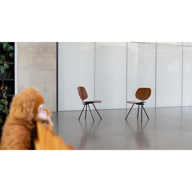 Set (2) folding chairs, model S88. Designed in 1956 by Osvaldo Borsani for Tecno, Italy. These mid century chairs feature...