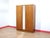 A stunning armoire made by renowned British furniture maker Austinsuite, this Mid Century Modern Vintage Teak Wardrobe...