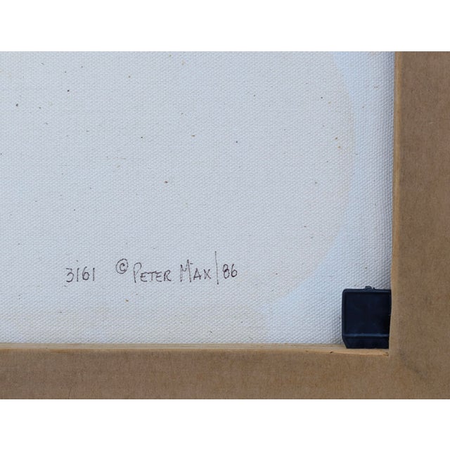 Original acrylic painting on canvas. Hand signed upper front by Peter Max. Canvas size: 11 x 14 inches. Custom framed as...