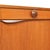 Elegant mid-century teak sideboard by Elliots of Newbury (EON), England, featuring clean lines, sculptural wooden pulls,...