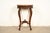 A gorgeous French Provincial Louis XV style side table In the manner of Romweber USA, Circa 1930s Beautiful carved walnut,...