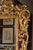 Large-scale, hand-carved and 22k gold gilded Florentine frame inset with newer glass. The dramatic, serpentine, foliate...