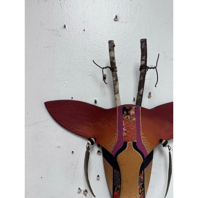 Design Plus Gallery presents a Handcrafted Clay Animal Wall Mask signed by artist Hilary. A striking mixed-media antelope...