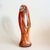 A beautiful example of mid-century American art glass, this hand-blown Arklahoma sculpture showcases a vivid orange and...