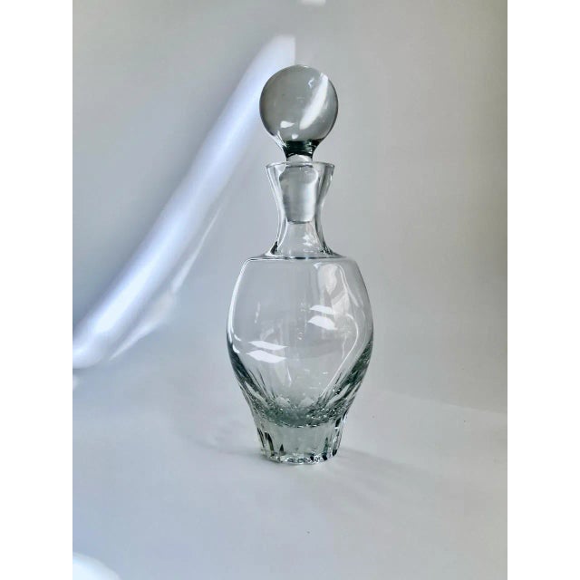 Mid Century Modern Svend Jensen for Krosno Clear Crystal Decanter with Globe Stopper. Featuring a contoured form, smooth...
