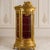 Make a dramatic statement with this large French Baroque-style display cabinet, designed to showcase collectibles, fine...