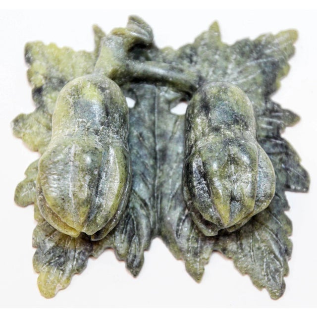 Vintage Chinese green jade hand carved stone amulet with acanthus flowers and leaves circa 1950's. Vintage Asian Chinese...