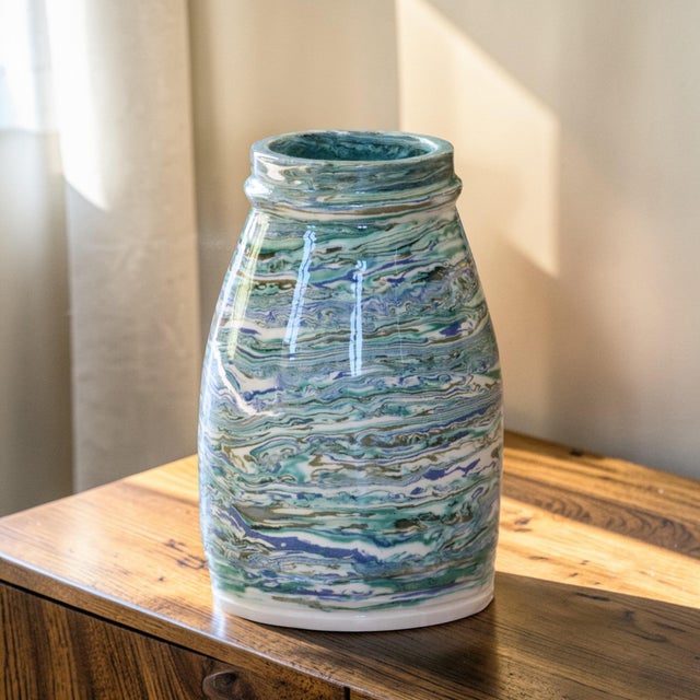 Unique piece. Handcrafted vase from a contemporary workshop, made of mixed clay, a ceramic technique that involves...
