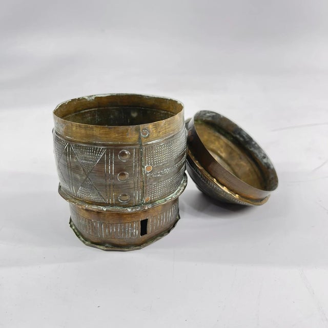 This beautiful embossed brass Forowa Box was crafted by a skilled Asante artist in the late 19th or early 20th Century....