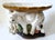 Offering a LARGE ceramic elephant sculpture topped with an oval catchall bowl, circa late 20th Century. This catchall is...