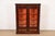 A gorgeous antique Eastlake Victorian or Renaissance Revival bookcase cabinet or display cabinet In the manner of Herter...