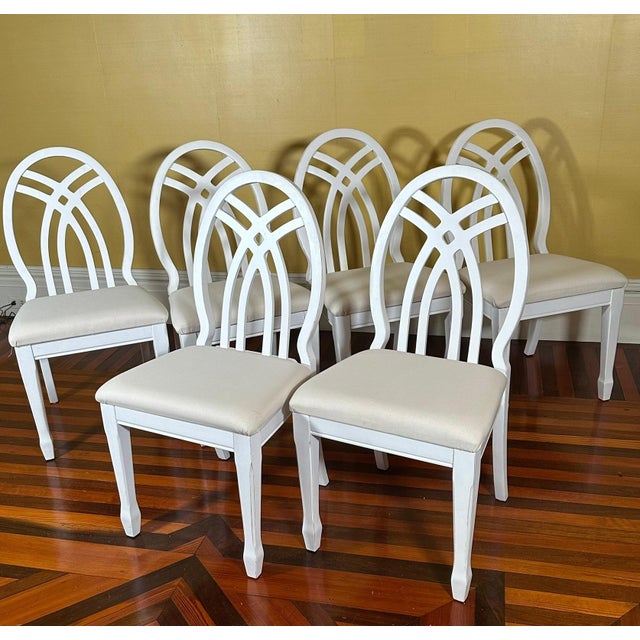 Universal Furniture White Dining Chairs Arched Open Work Geometric Rounded Back Set of Six This exceptionally stylish set...